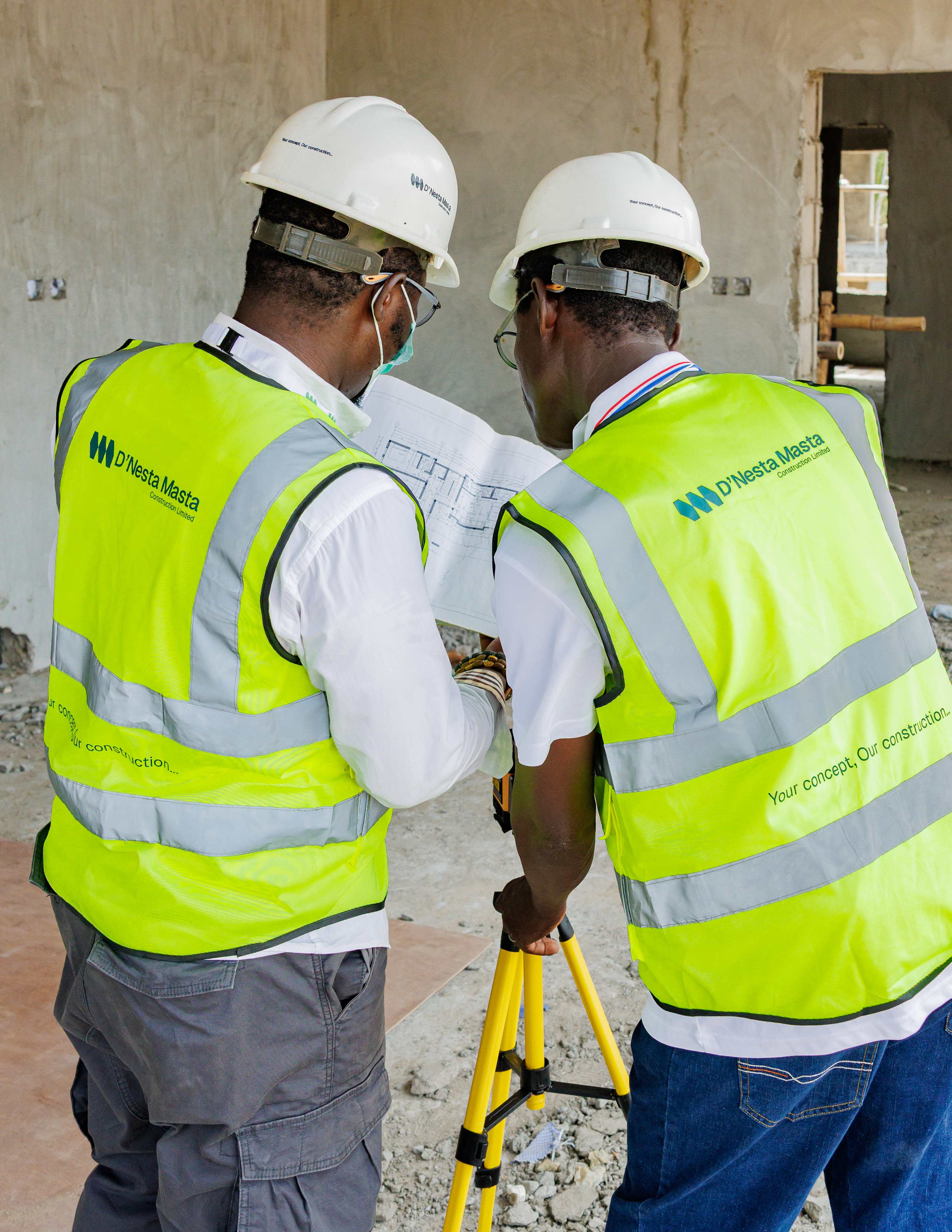 Engineers reviewing structural blueprints